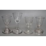 Four 18th and 19th century assorted toasting glasses, tallest 12cms high