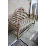 A Lutyens style weathered teak garden bench width 166cm, depth 62cm, height 106cm