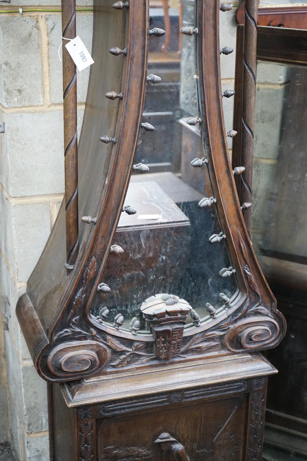 An early 20th century Flemish carved oak and walnut longcase clock, height 240cms. - Image 3 of 5