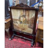 A Victorian rosewood firescreen inset polychrome tapestry panel, width 79cm, height 122cm