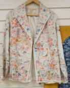 A Chinese 1930’s cream silk and multi coloured embroidered evening jacket,