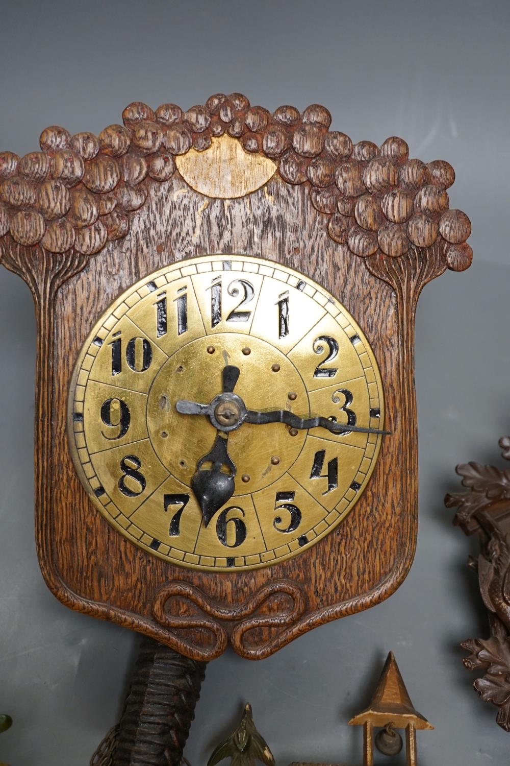 An early 20th century German Jugendstil oak wall timepiece, four miniature Black Forest timepieces - Image 4 of 8