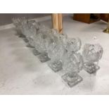 A set of twelve Victorian square base cut glass salts and four other 19th century clear glass