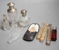 A late Victorian silver mounted ruby glass cylindrical scent bottle, engraved in the style of Kate