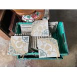 Fifty five decorative earthenware floor tiles, each 20cm square