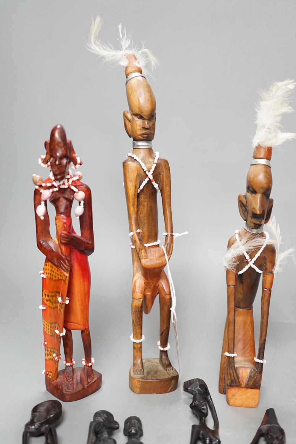 12 African carved wood stick figures, tallest 38cms high - Image 6 of 7