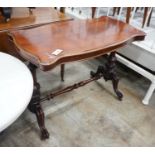 A Victorian mahogany stretcher table, length 106cm, depth 52cm, height 75cm