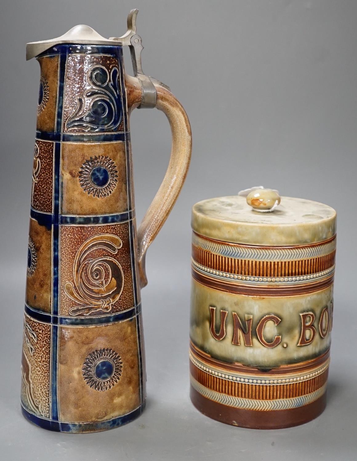 A Royal Doulton stoneware ‘UNC. BORIC.’ drug jar 18cm and a Doulton Slater’s patent flagon, 33cm