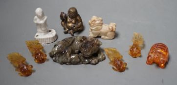 A group of Chinese jade, hardstone, faux amber carvings and models