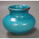 A Kashan style turquoise glazed vase. 10cm tall