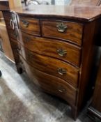 A George III serpentine mahogany chest of drawers, width 115cm, depth 55cm, height 104cm