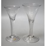 An 18th century airtwist stem wine glass, together withanother 18th century teardrop stem wine