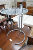 In the style of Eileen Gray - An E 1027 style circular chrome and smoked glass telescopic occasional