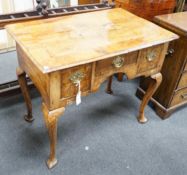 A George I walnut lowboy with quarter veneered top, width 87cm, depth 55cm, height 74cm