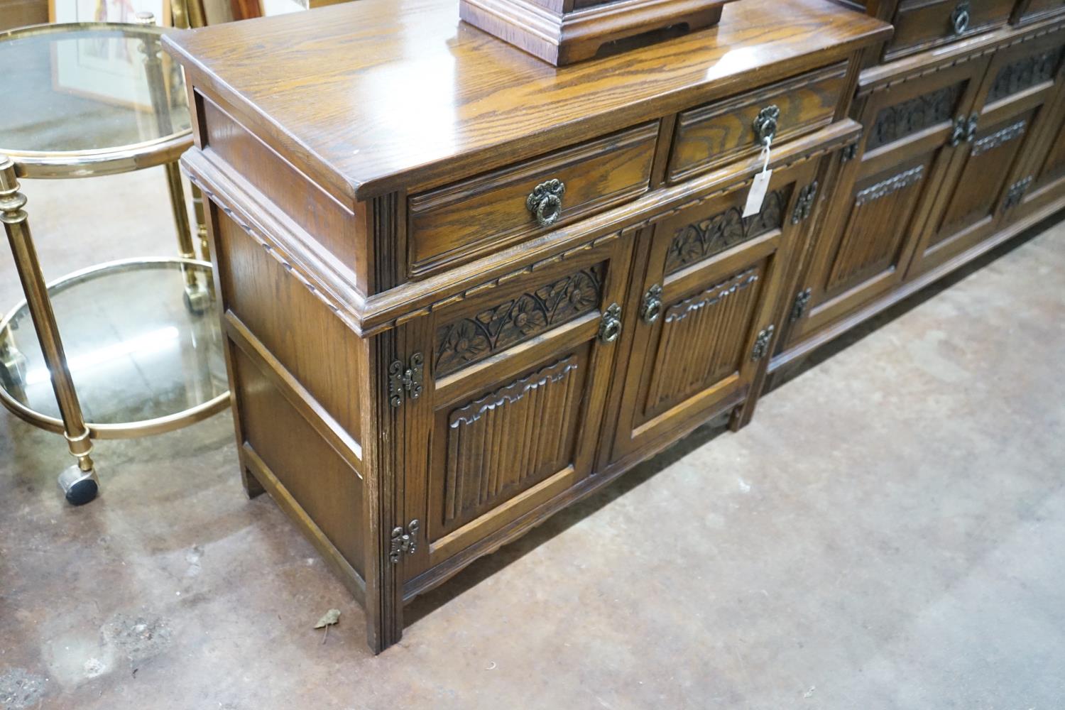 A reproduction 18th century style carved and linen fold moulded oak side cabinet and matching - Image 3 of 3