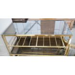 A brass and smoked glass two tier rectangular coffee table, width 99cm, depth 51cm, height 41cm