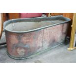 A 19th century copper bath of tapering form, length 162cm, depth 68cm, height 63cm