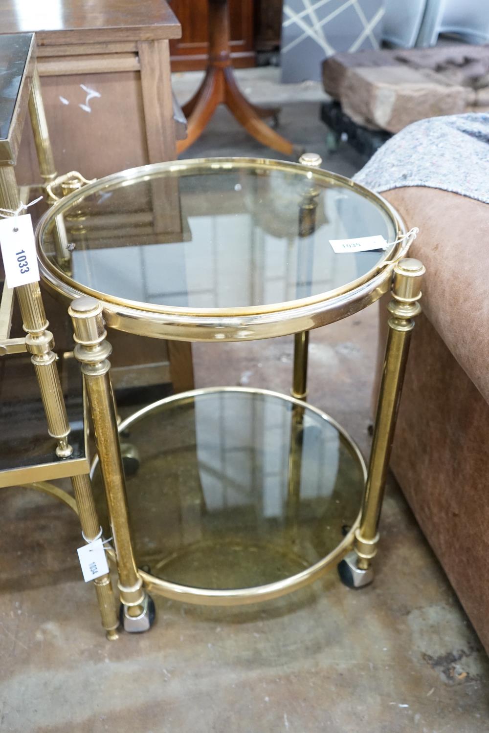 A circular smoked glass and brass tray top two tier occasional table, diameter 57cm, height 64cm - Image 3 of 3