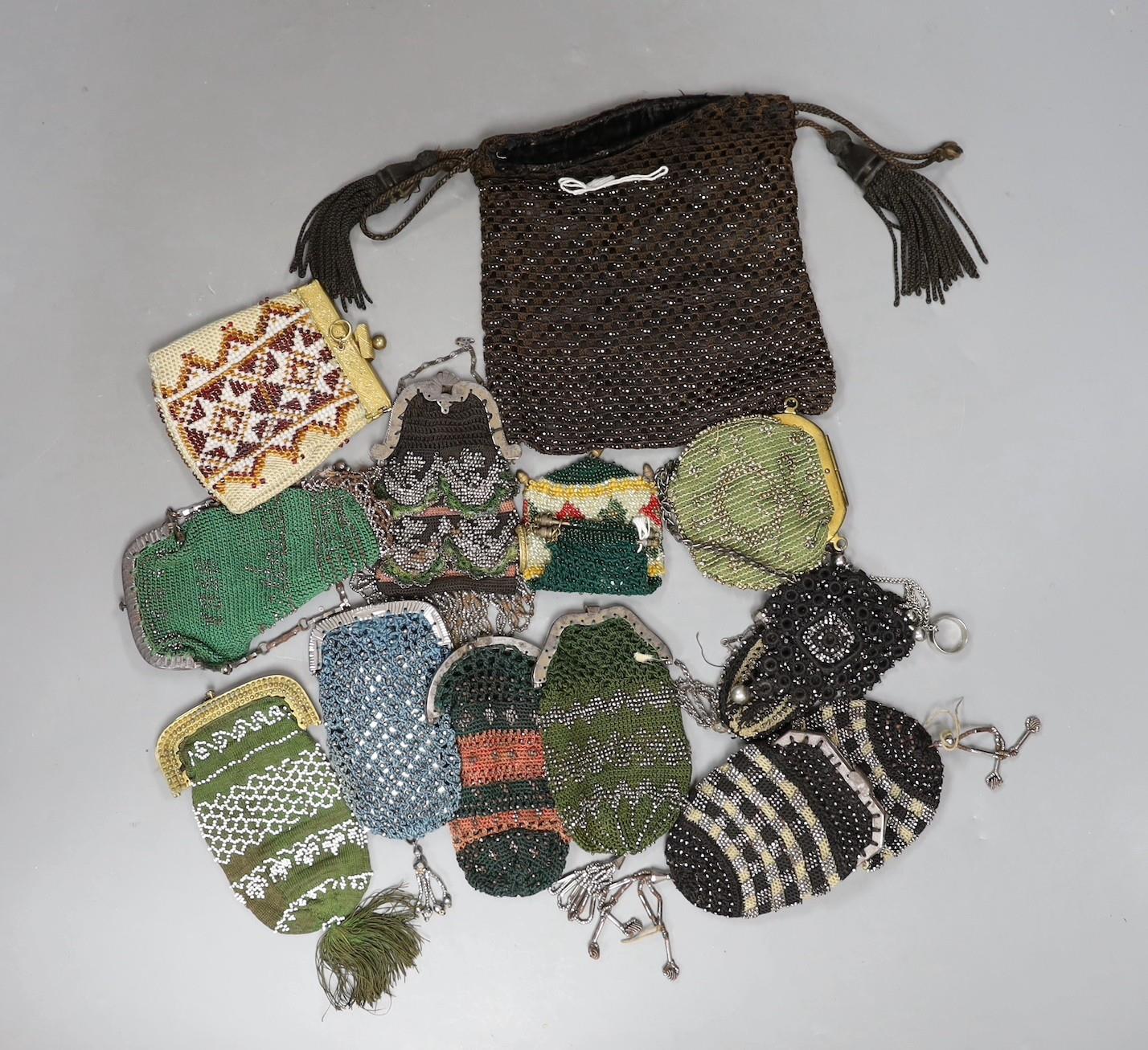 Nine crochet and cut steel 19th century ladies coin purses, seven with metal frames and clasps,