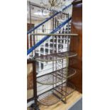 A 19th century French wrought iron and brass bakers rack, width 115cm, depth 46cm, height 215cm