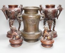 A pair of Japanese bronze vases and covers, 41 cm high and a Japanese two handled vase, 26 cm