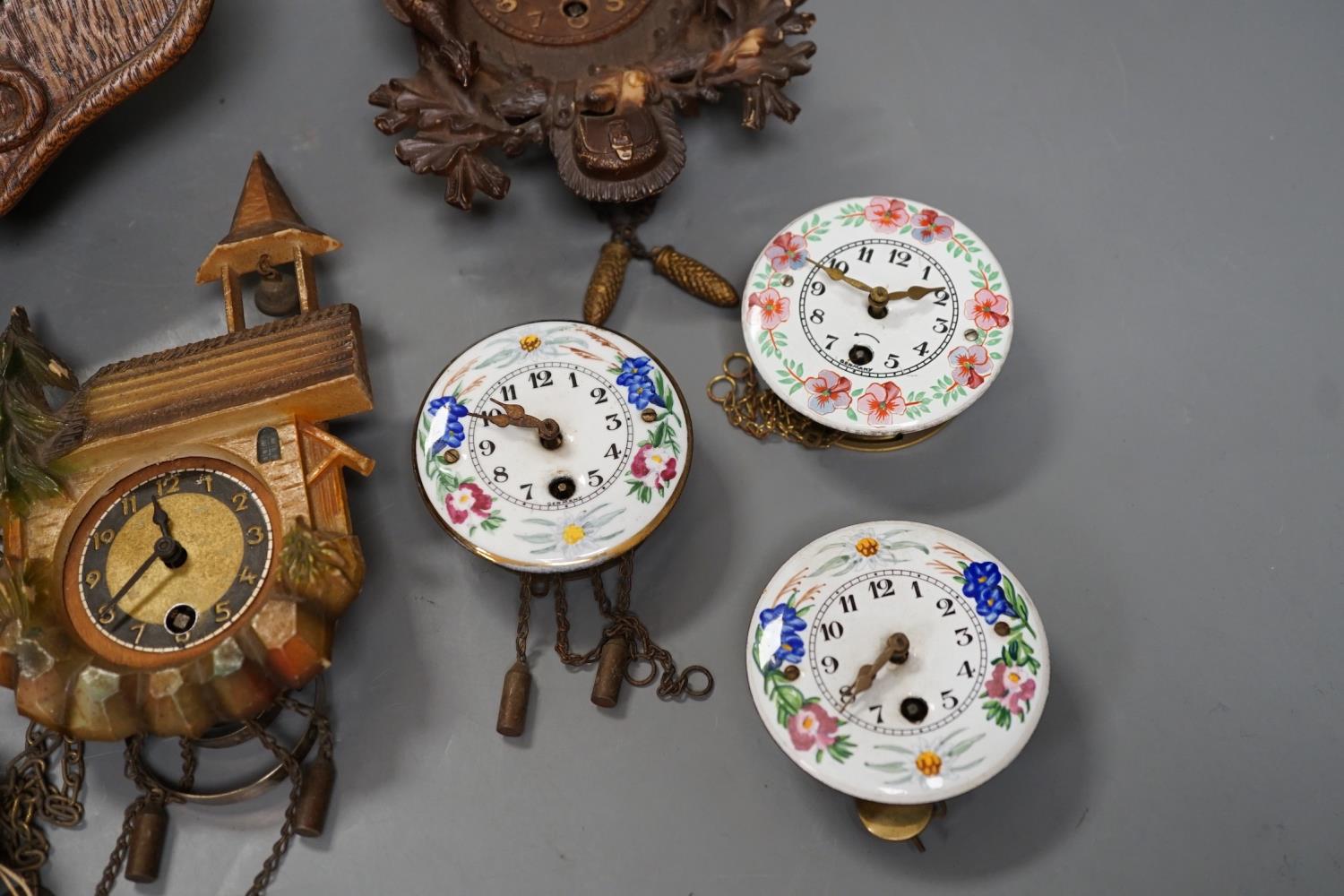 An early 20th century German Jugendstil oak wall timepiece, four miniature Black Forest timepieces - Image 7 of 8