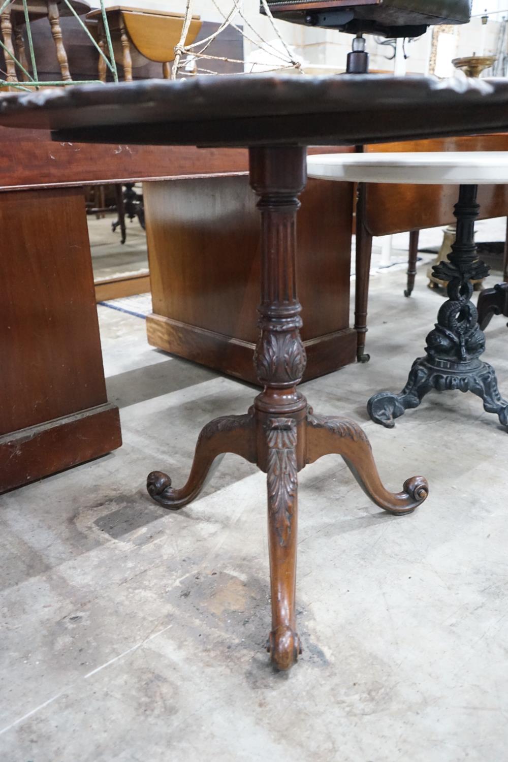 A George III style circular mahogany tilt top tripod tea table, diameter 81cm, height 74cm - Image 3 of 3