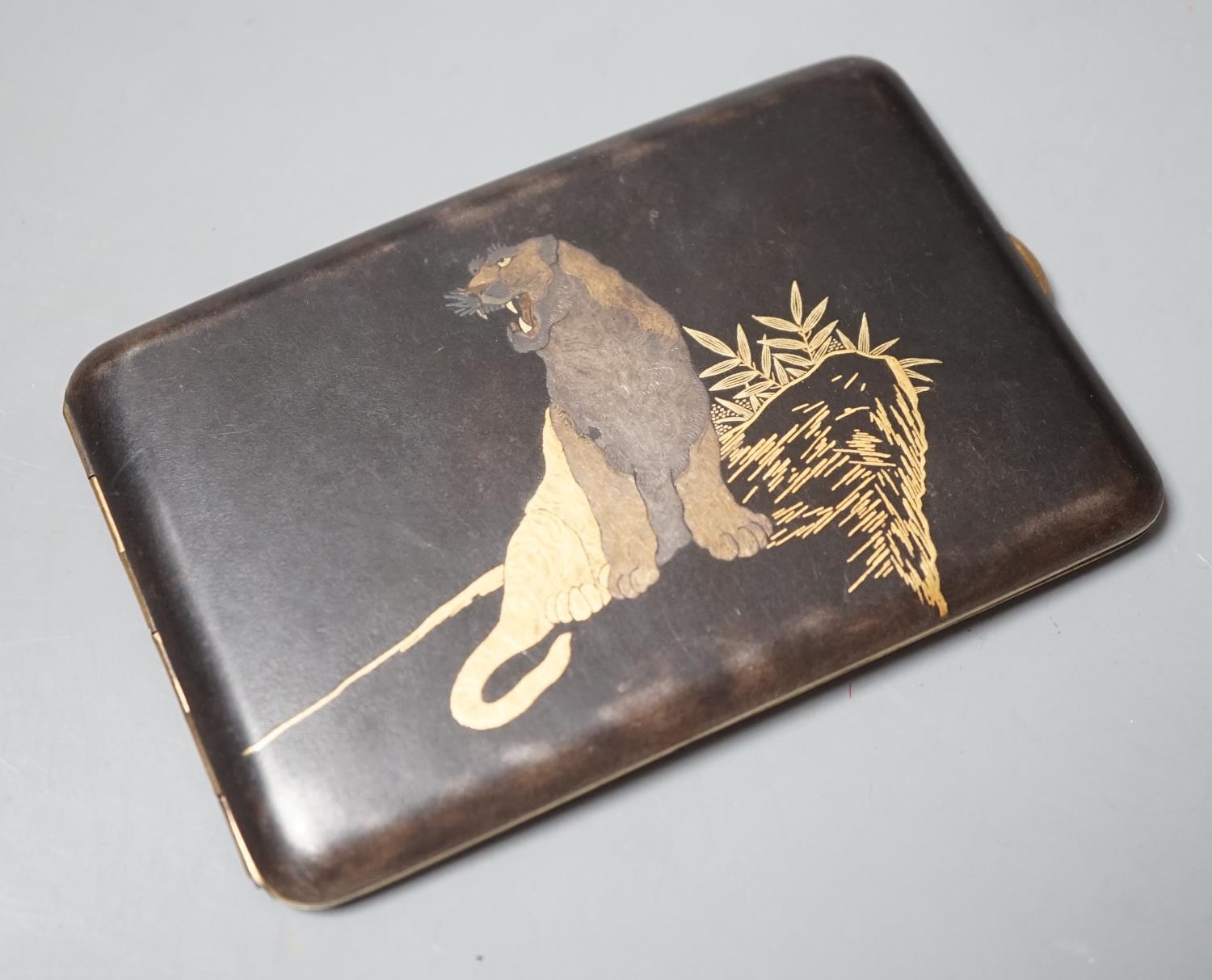 An early 20th century Japanese damascened iron cigarette case by Abe Shoten, 8x12cm