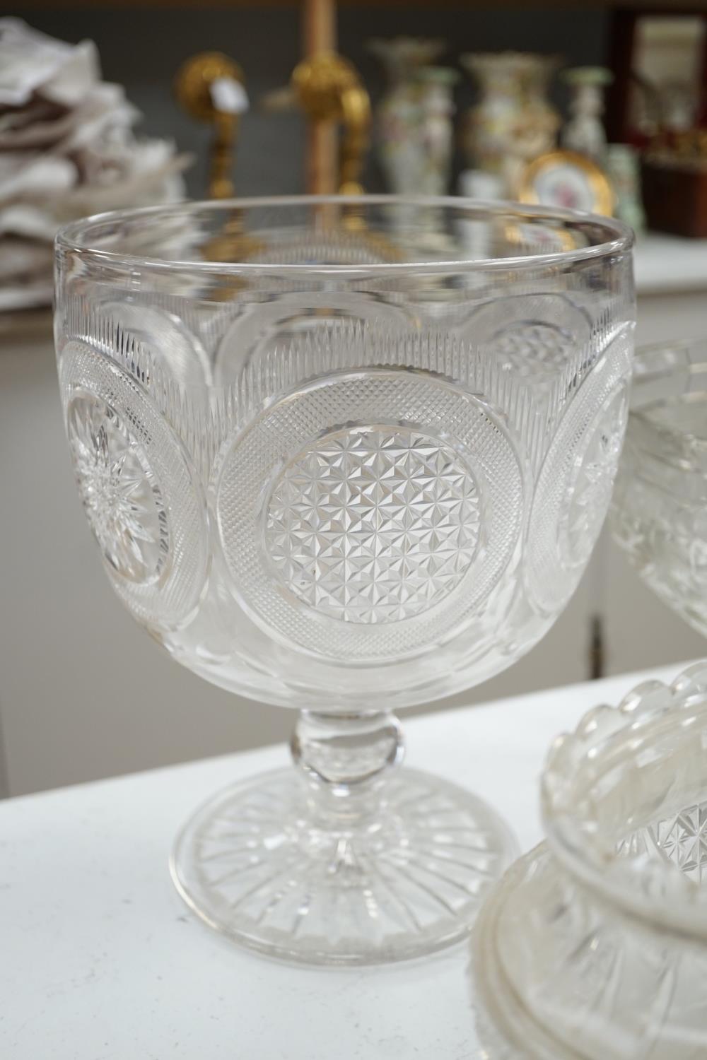 An early 20th century oval cut glass bowl on gilt metal stand, a pair of slice cut decanters and - Image 6 of 6