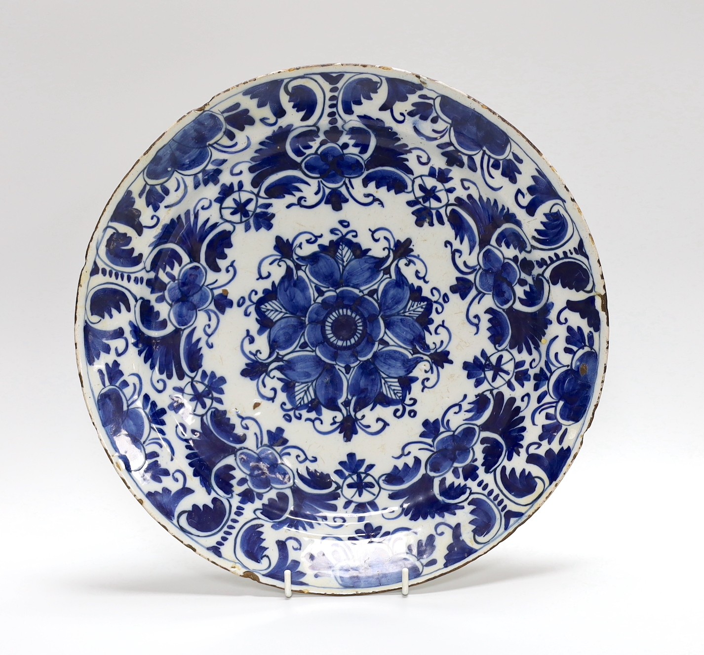 An 18th century blue and white Delft dish, 32cm diameter