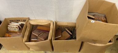 ° ° A quantity of assorted leather bindings