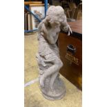 A reconstituted stone garden ornament of a female bather, height 84cm