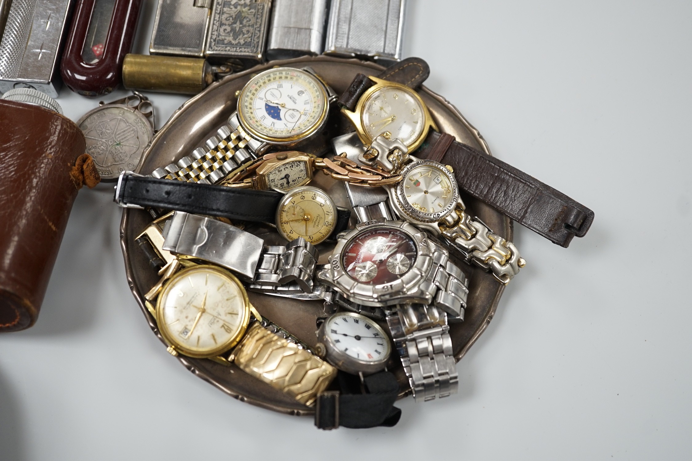 A collection of mixed wristwatches and cigarette lighters and a camera - Image 2 of 6