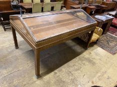 A mid century brass mounted mahogany museum specimen display cabinet with twin hinged slant top,