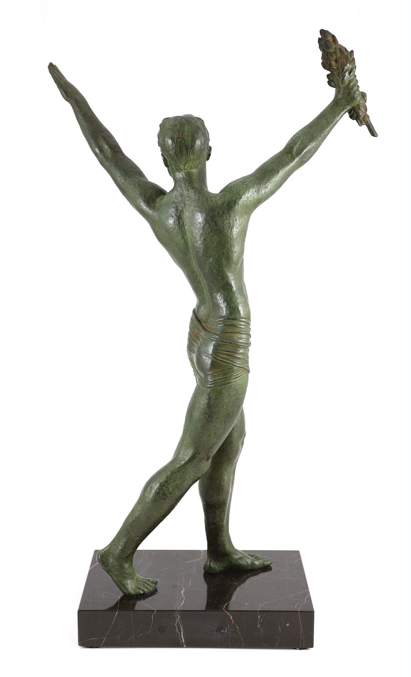 J. Darcourt. NB. An Art Deco patinated spelter figure of a victorious athlete, standing with arms - Image 4 of 5