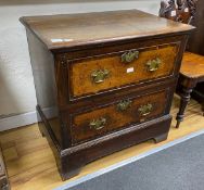 A late 18th century oak and mahogany banded chest of two drawers, width 76cm, depth 49cm, height