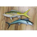 Two decorative painted composition ‘fish’ wall plaques