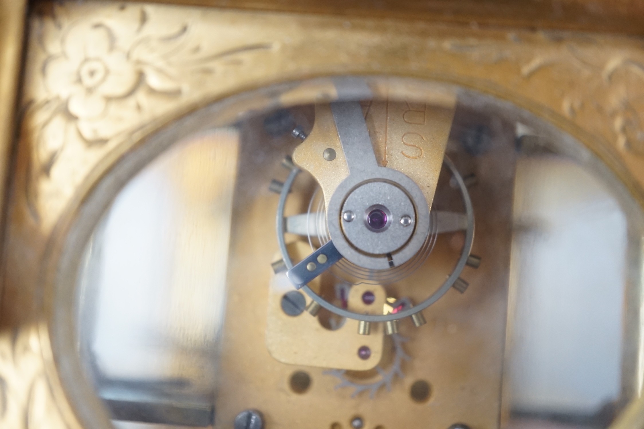 A late 19th century French eight day timepiece, in an engraved brass gorge case. 12cm tall - Image 6 of 6