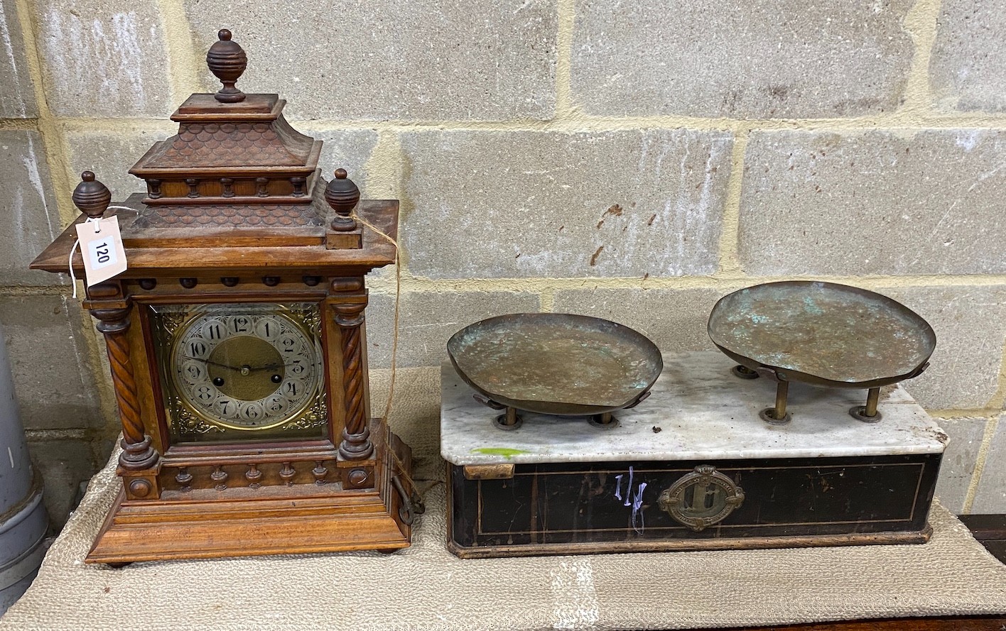 An early 20th century walnut mantel clock, height 53cm together with a set of Victorian scales