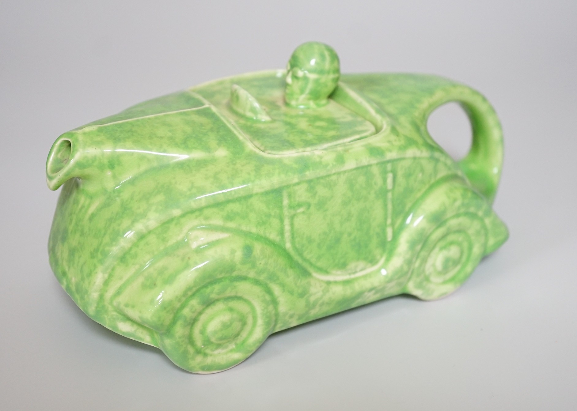 A Sadler's green-glazed novelty racing car teapot, 22cm