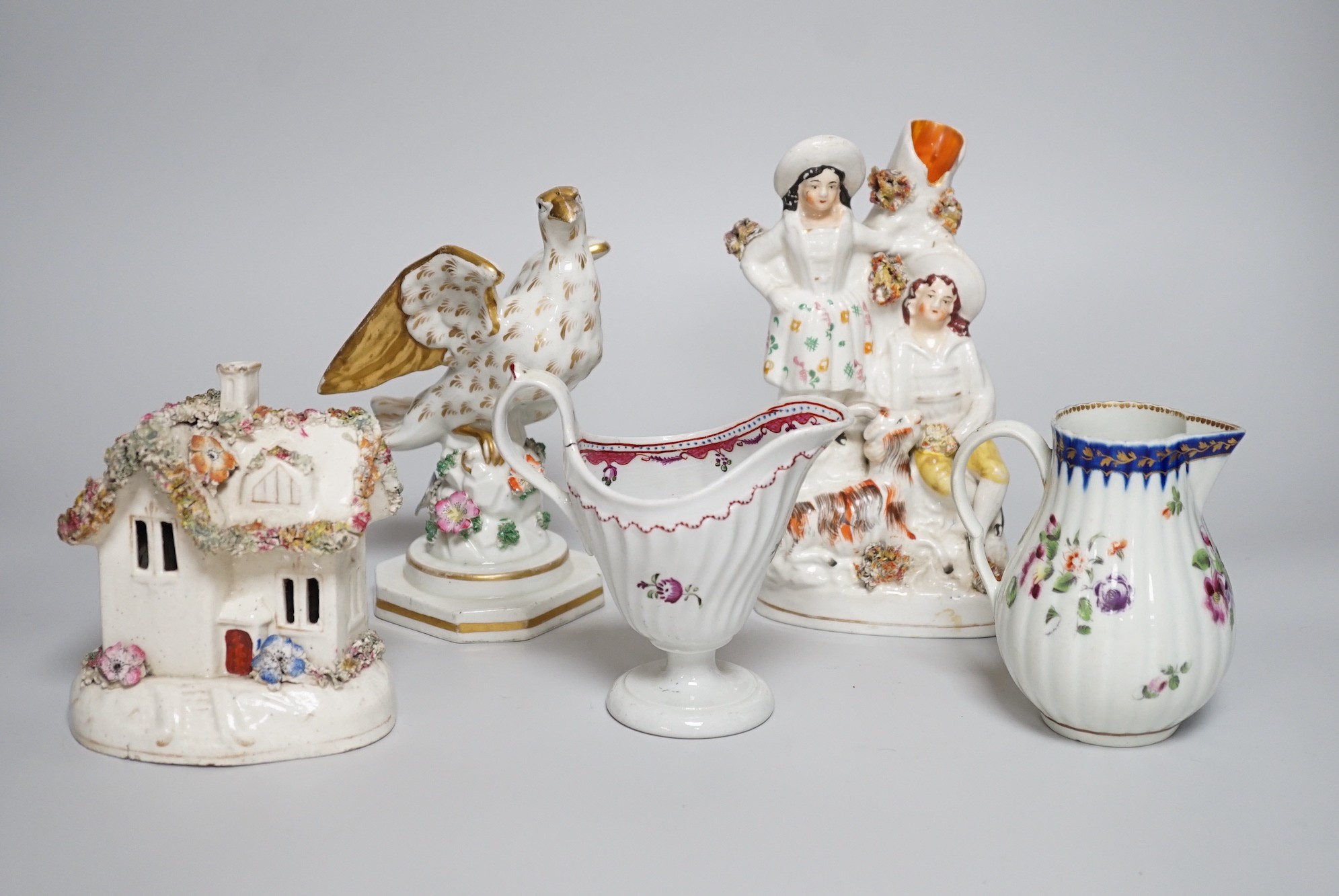 A Worcester milk jug, c.1780, a Newhall-type cream jug, c.1795, a Staffordshire porcelain model of