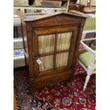 A 19th century French provincial miniature fruitwood armoire, width 69cm, depth 35cm, height 100cm