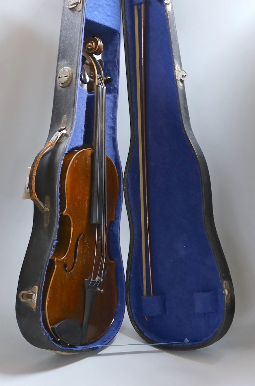 A Maidstone violin, with bow, cased.violin 59 cms high.