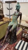 A bronzed resin sculpture of a female Greek warrior, height 174cm