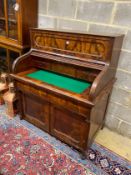 A 19th century French figured mahogany tambour cylinder desk, width 110cm, depth 74cm, height 122cm