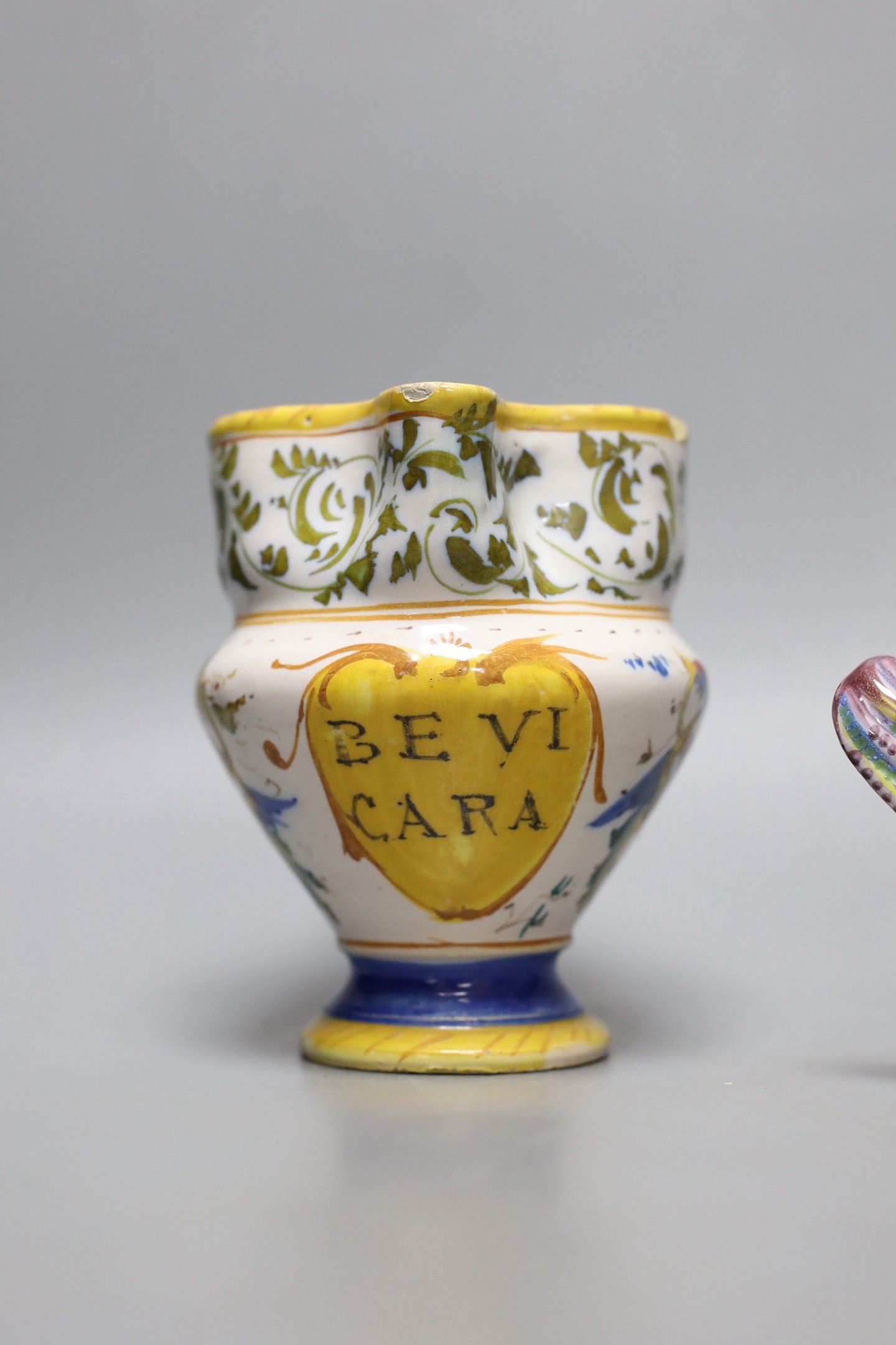 An Italian maiolica pinched beak jug, 12cm tall, and a similar dish - Image 2 of 4