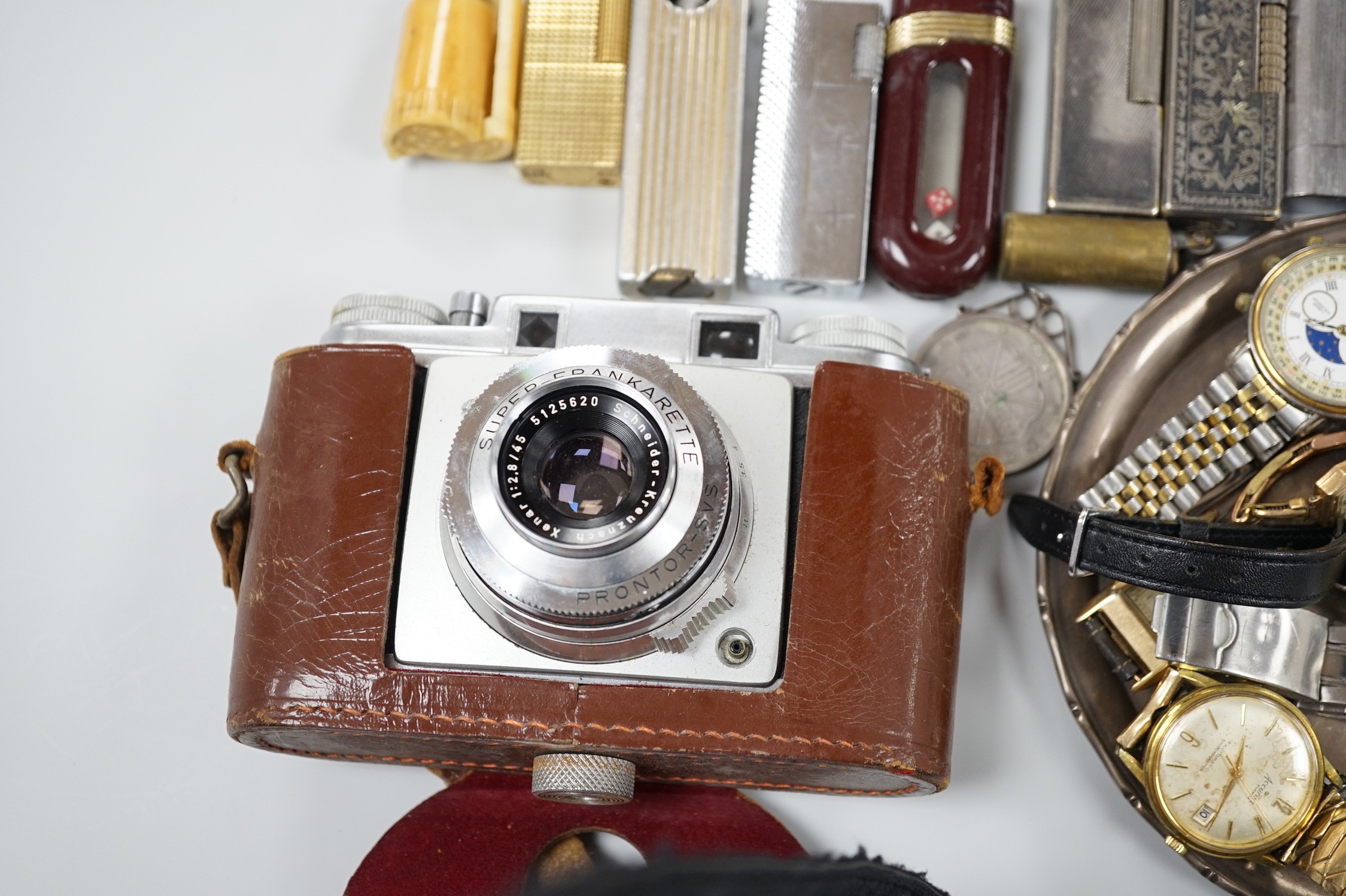 A collection of mixed wristwatches and cigarette lighters and a camera - Image 5 of 6