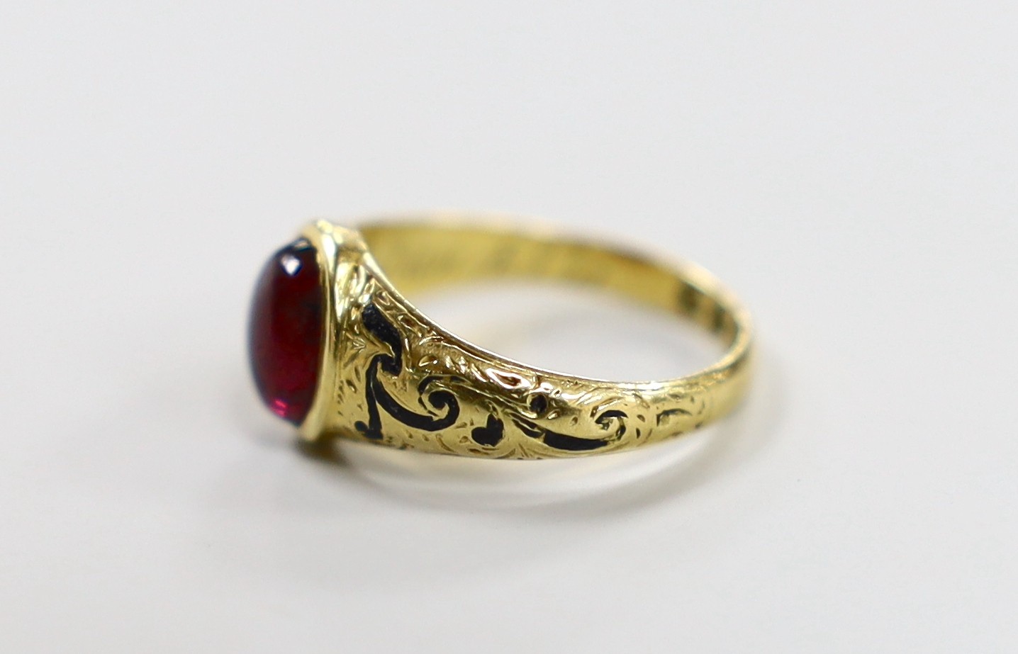 A Victorian 18ct gold, cabochon garnet and black enamel set memorial ring, the shank interior - Image 2 of 7