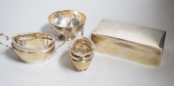A George V silver milk jug and sugar bowl, London, 1917, a silver mounted cigarette box and a