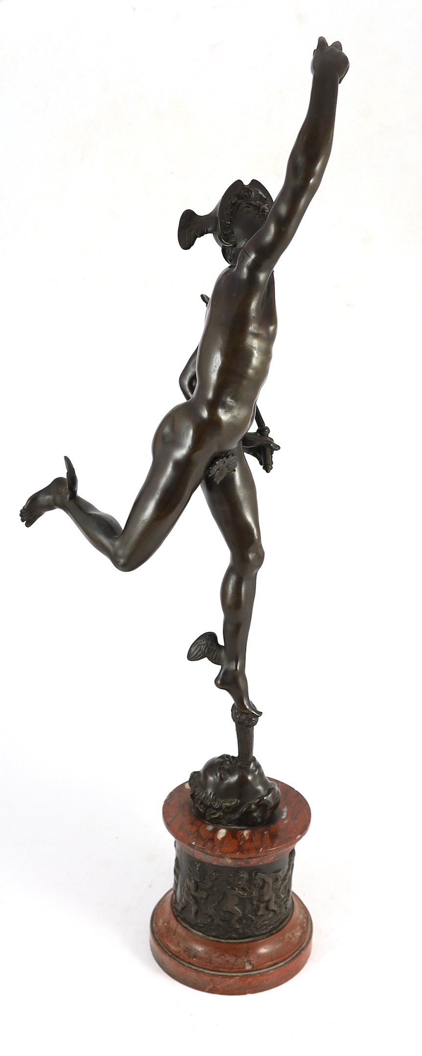After Giambologna. A tall Grand Tour bronze figure of Mercury, on red marble socle with bronze - Image 5 of 6